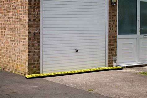 This product forms a tight seal around your garage door, preventing leaves, snow, and water from being blown beneath it. . Garage door water barrier